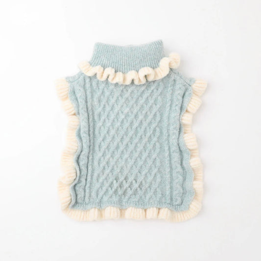 RUFFLED CABLE KNIT PONCHO