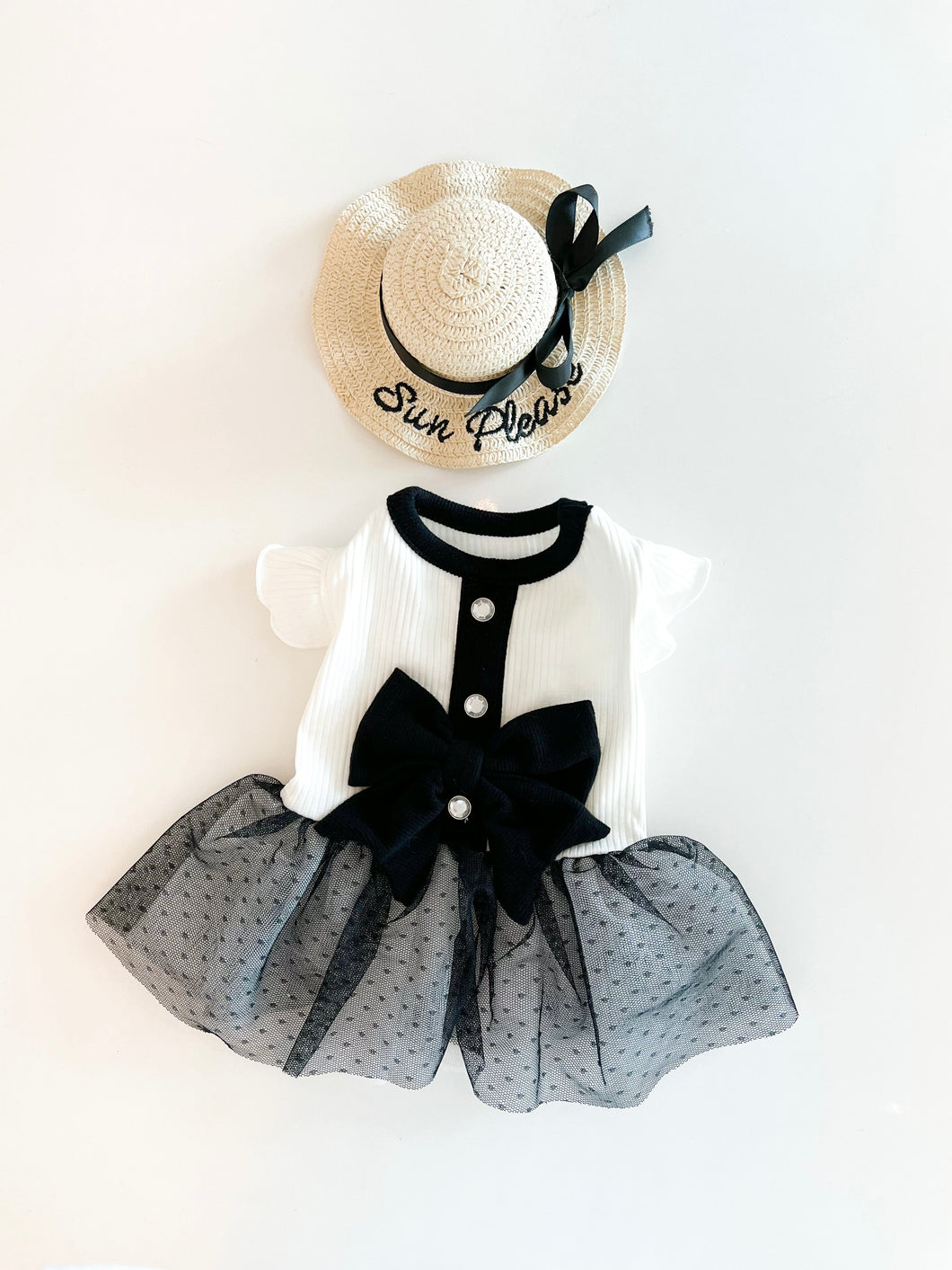 BLACK AND WHITE DRESS WITH BLACK BOW
